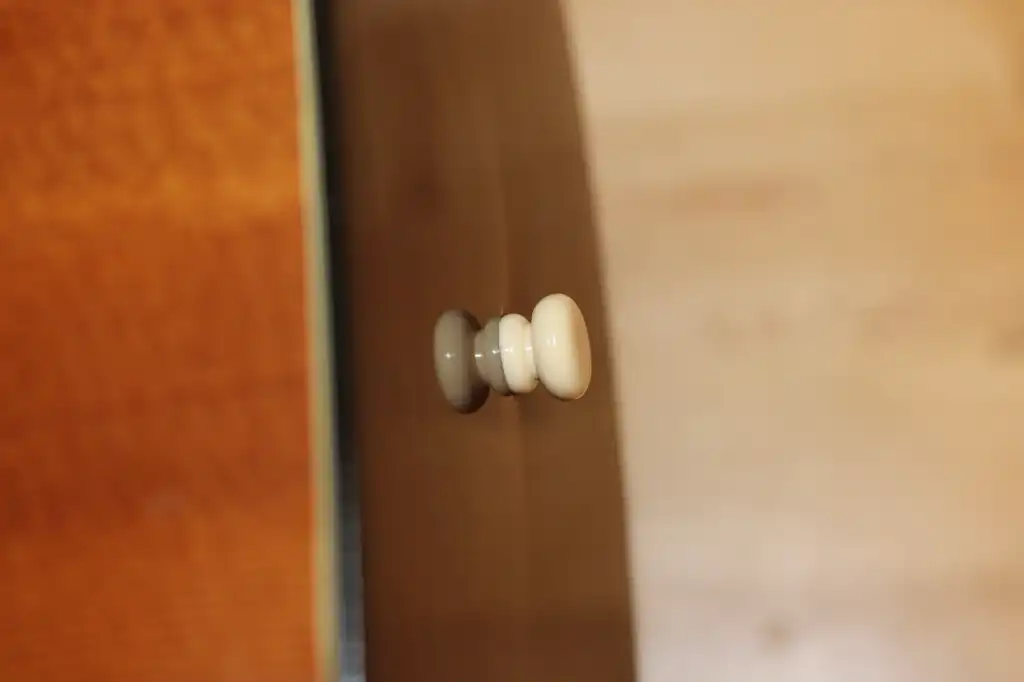 Cozad Guitars - End Pin Tail Block Impact