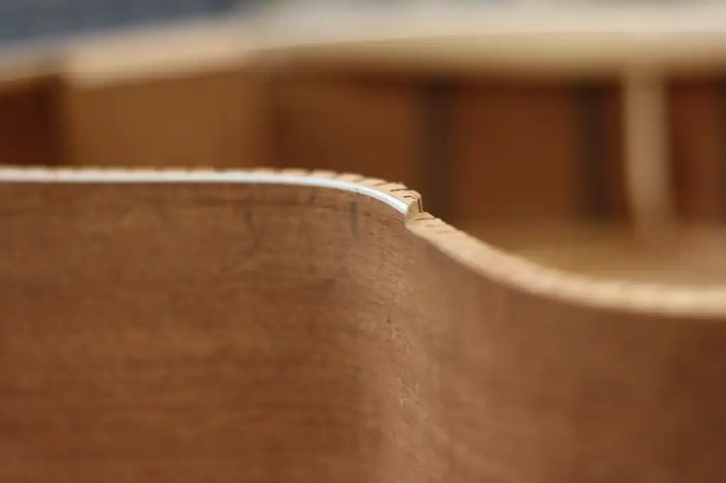 Cozad Guitars - Side Interlock at Upper Bout